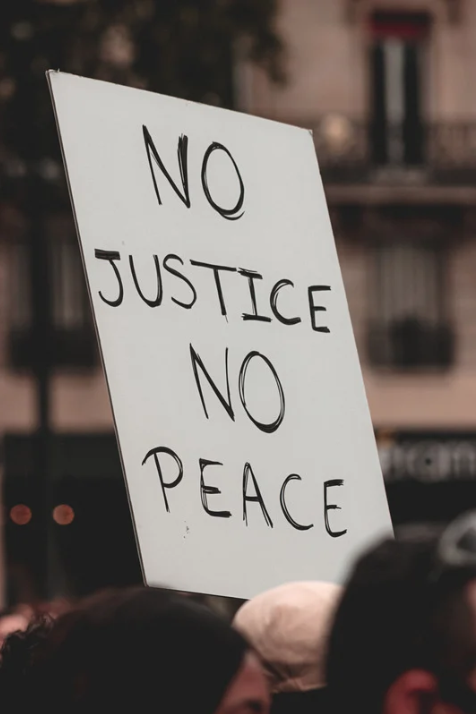 racial justice protest sign "No justice no peace"